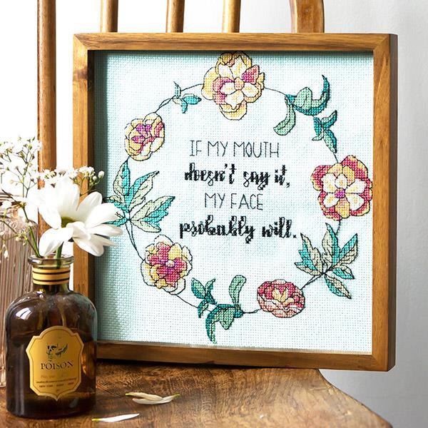 How to frame cross stitch in an embroidery hoop - Peacock & Fig